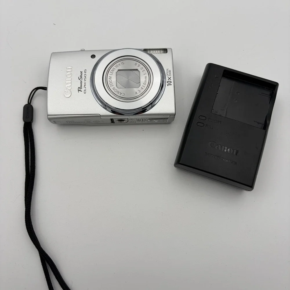 Canon PowerShot ELPH 150 IS Compact Digital Camera Silver w/ Battery Charger